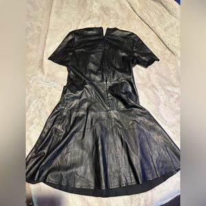 Chelsea and violet medium black poly urethane dress.